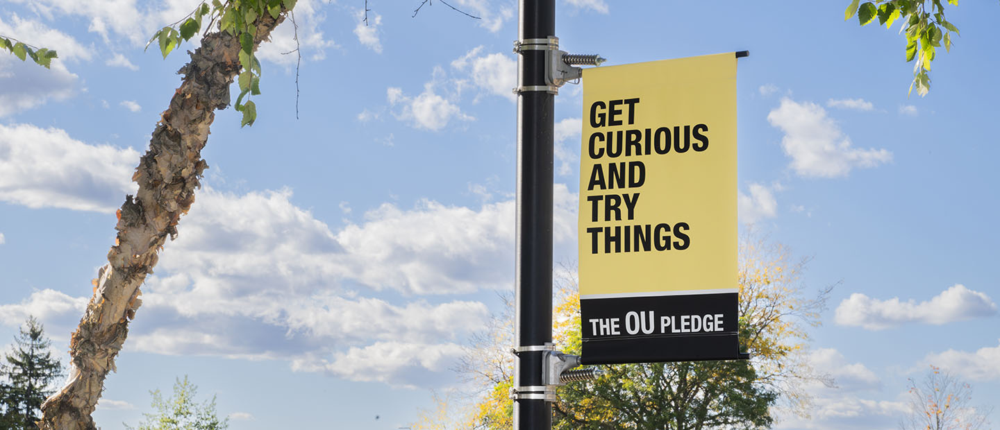 A banner at Oakland University that says 