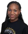Asha Mullings smiling at the camera