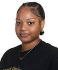 Tamya Monday smiling at the camera
