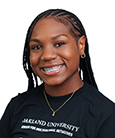 A headshot of Ashamoye Mullings