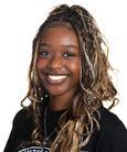 Geneece Davis smiling at the camera