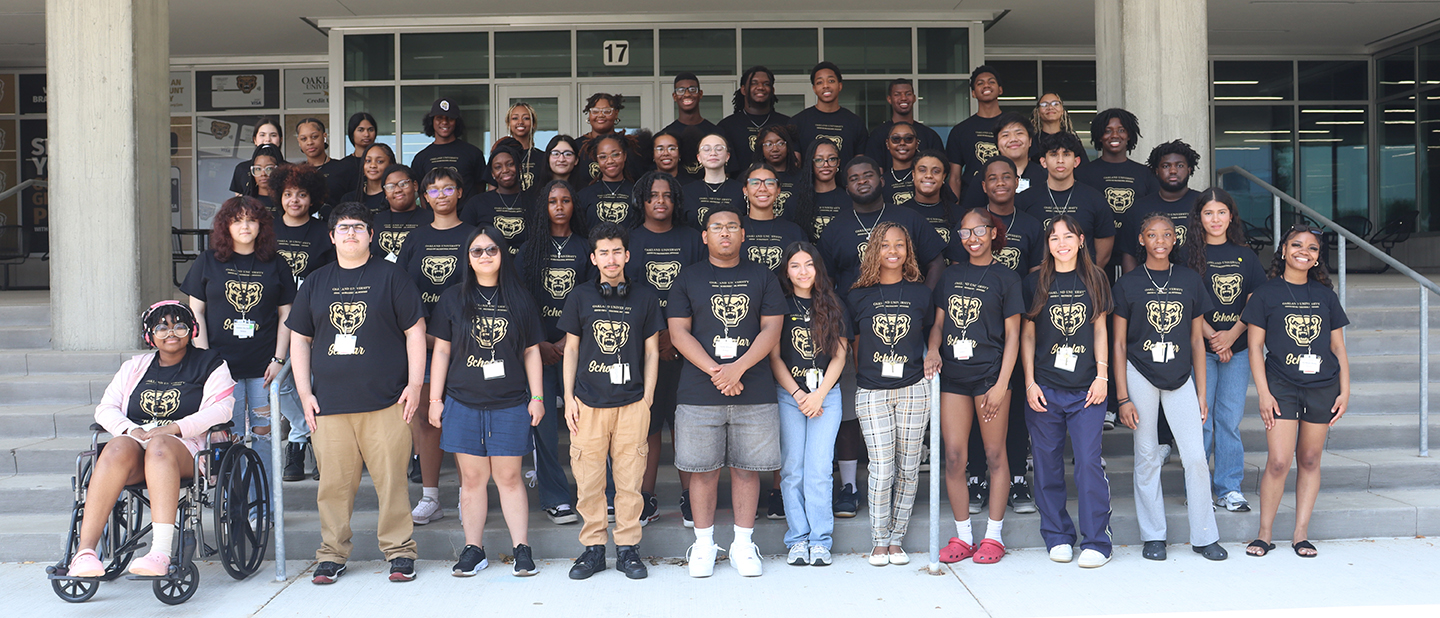 Group of students smiling into camera
