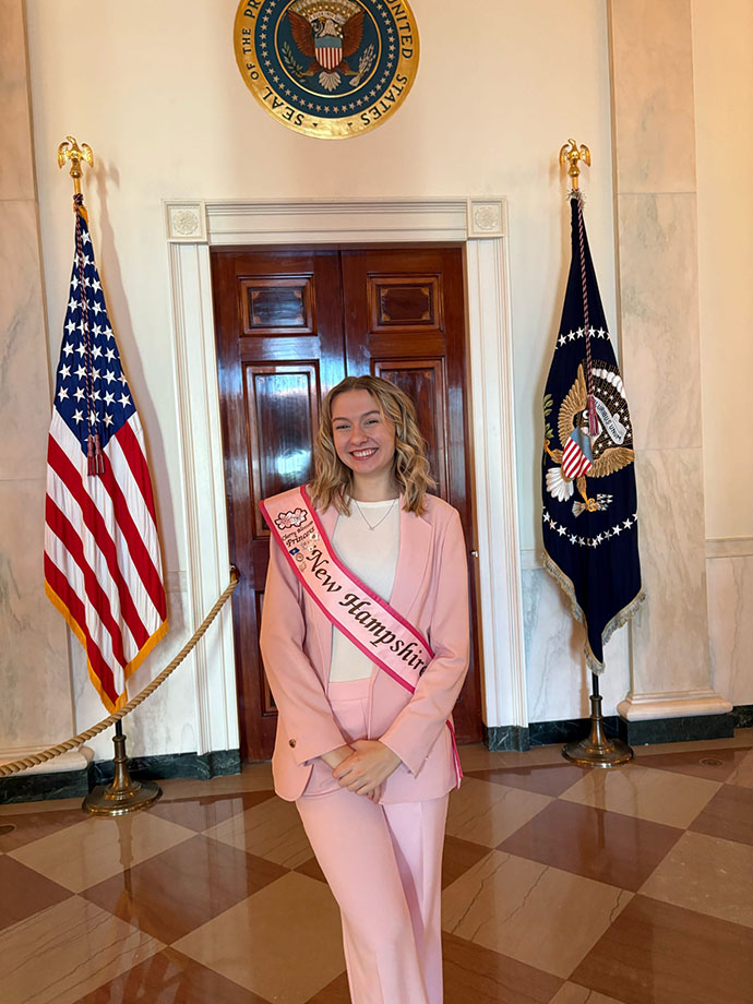 Mallory Waligora poses for a photo with her  Miss New Hampshire Cherry Blossom Princess outfit on.
