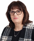 Alicia Arbour, looking at the camera