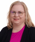 Michelle Smith, smiling at the camera