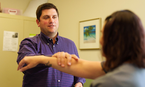 Dr. Luczak with a patient