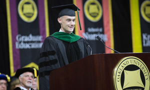 Dr. Sams at a podium