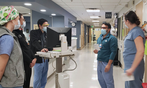 Dr. Brahmbhatt in a clinical setting