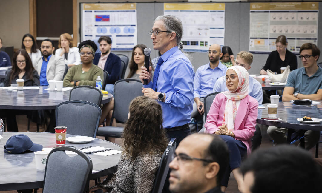 An image of Ken Mitton speaking during the event