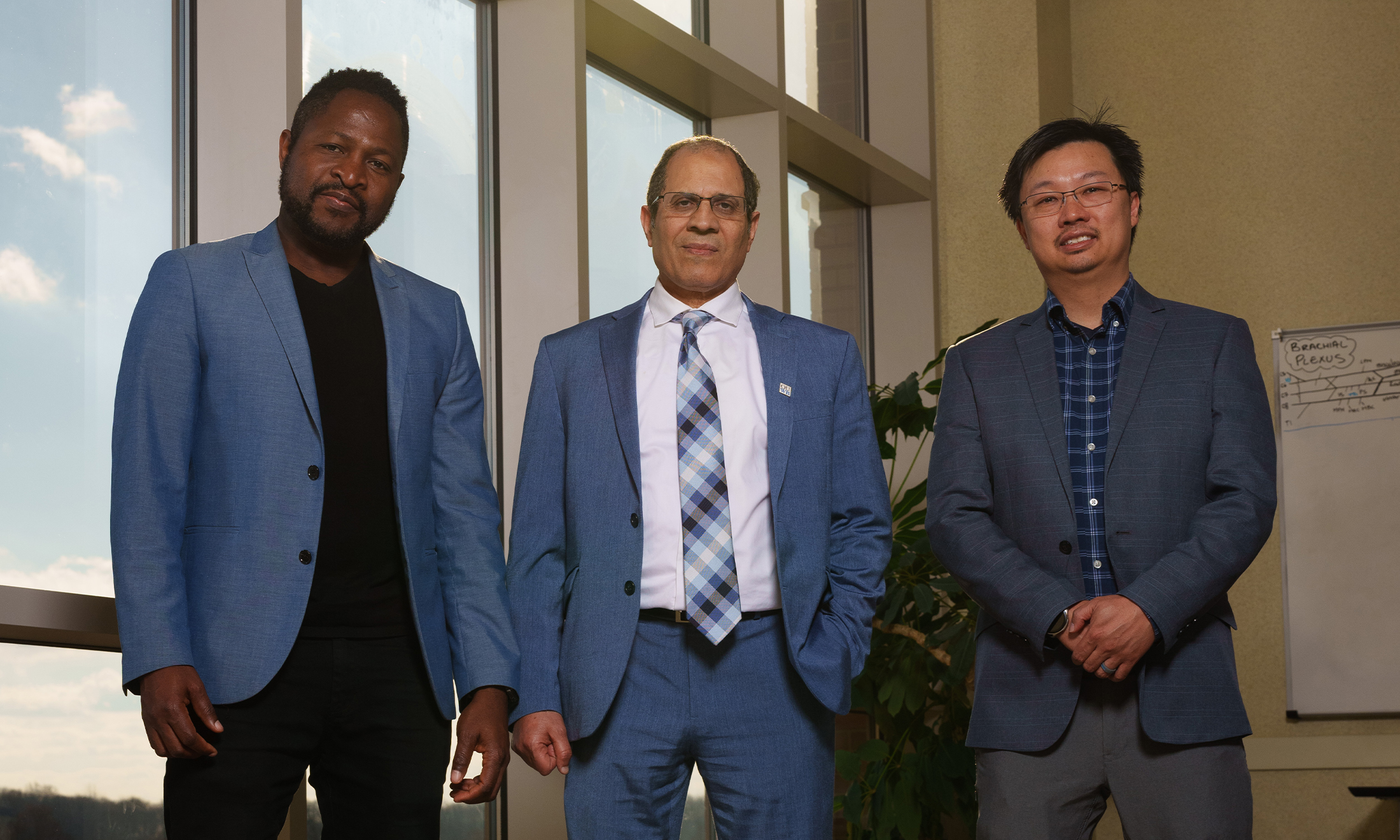 An image of the three researchers working on the project