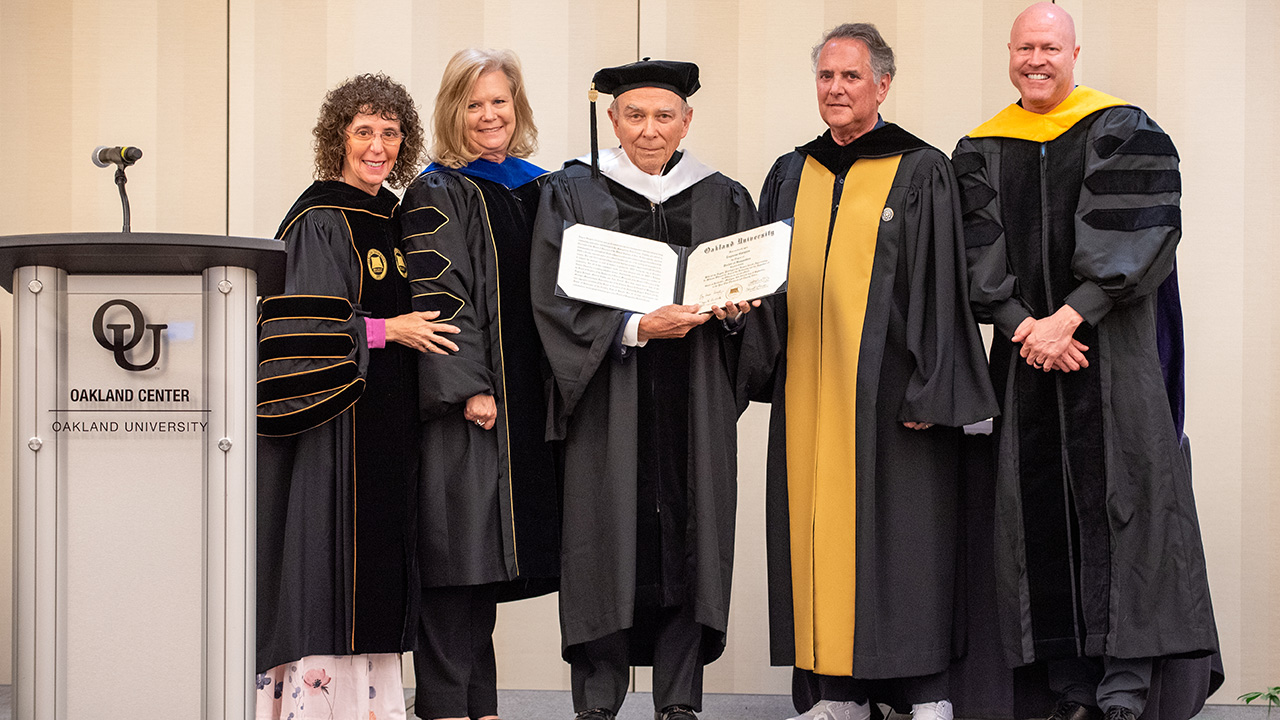 Dr. Eugene Gargaro, Jr. (center) with Dr. Ora Hirsch Pescovitz, president of Oakland University; Dr. Britt Rios-Ellis, executive vice president of Academic Affairs and Provost; Robert Schostak, chair of the Oakland University Board of Trustees; and Dr. Charles Pierce, dean and professor of management in the School of Business Administration