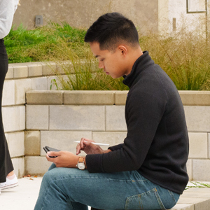 A student using a tablet at Oakland University
