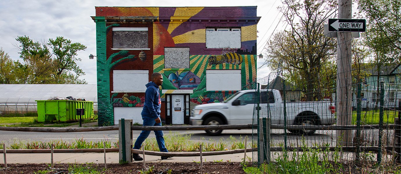 A man walking down the sidewalk