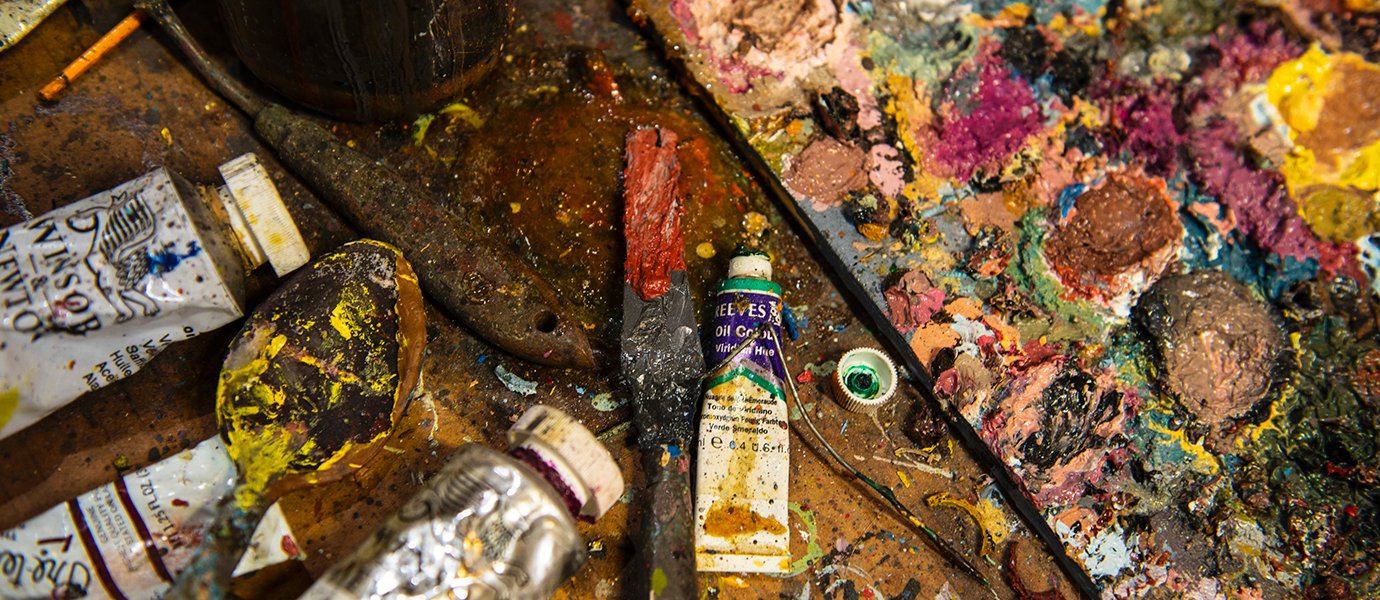 Paint and paint supplies on a table