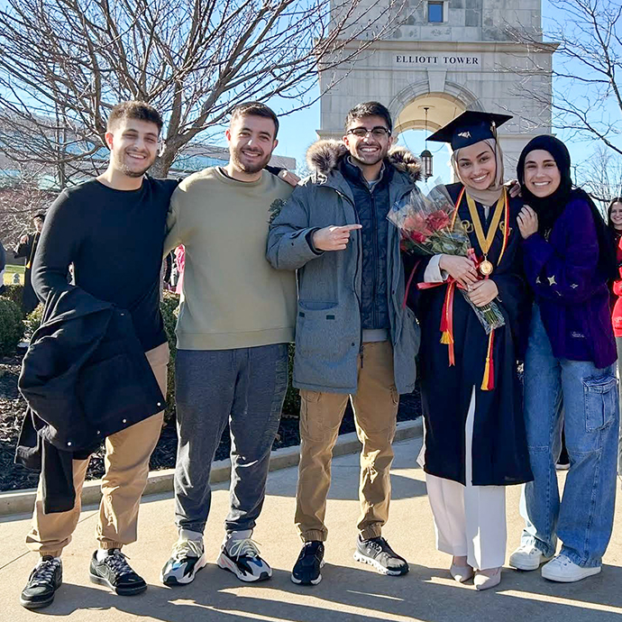 Students standing together on campus