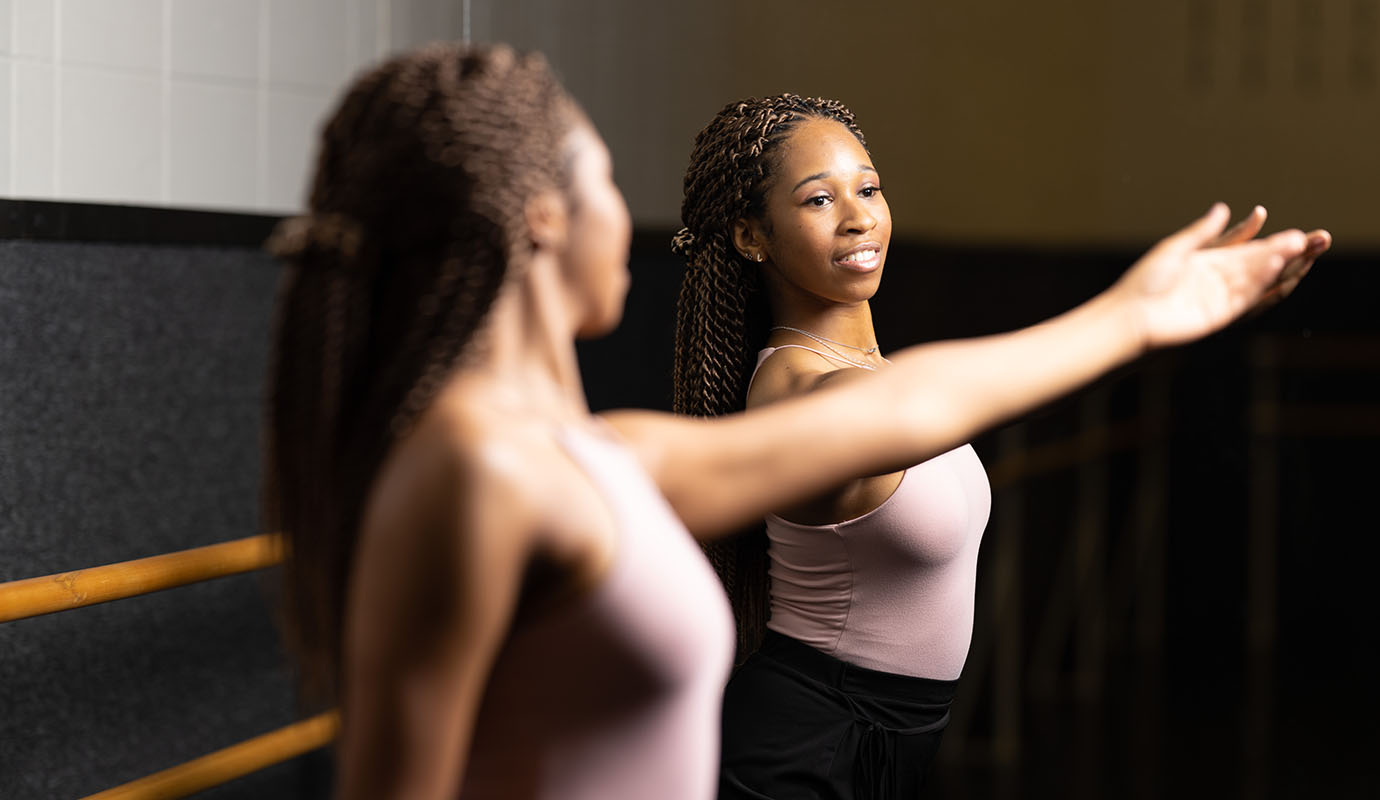 A student practicing dance