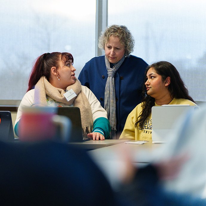 A professor talking to students