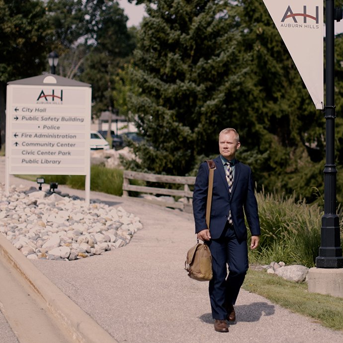 Man walking on sidewalk