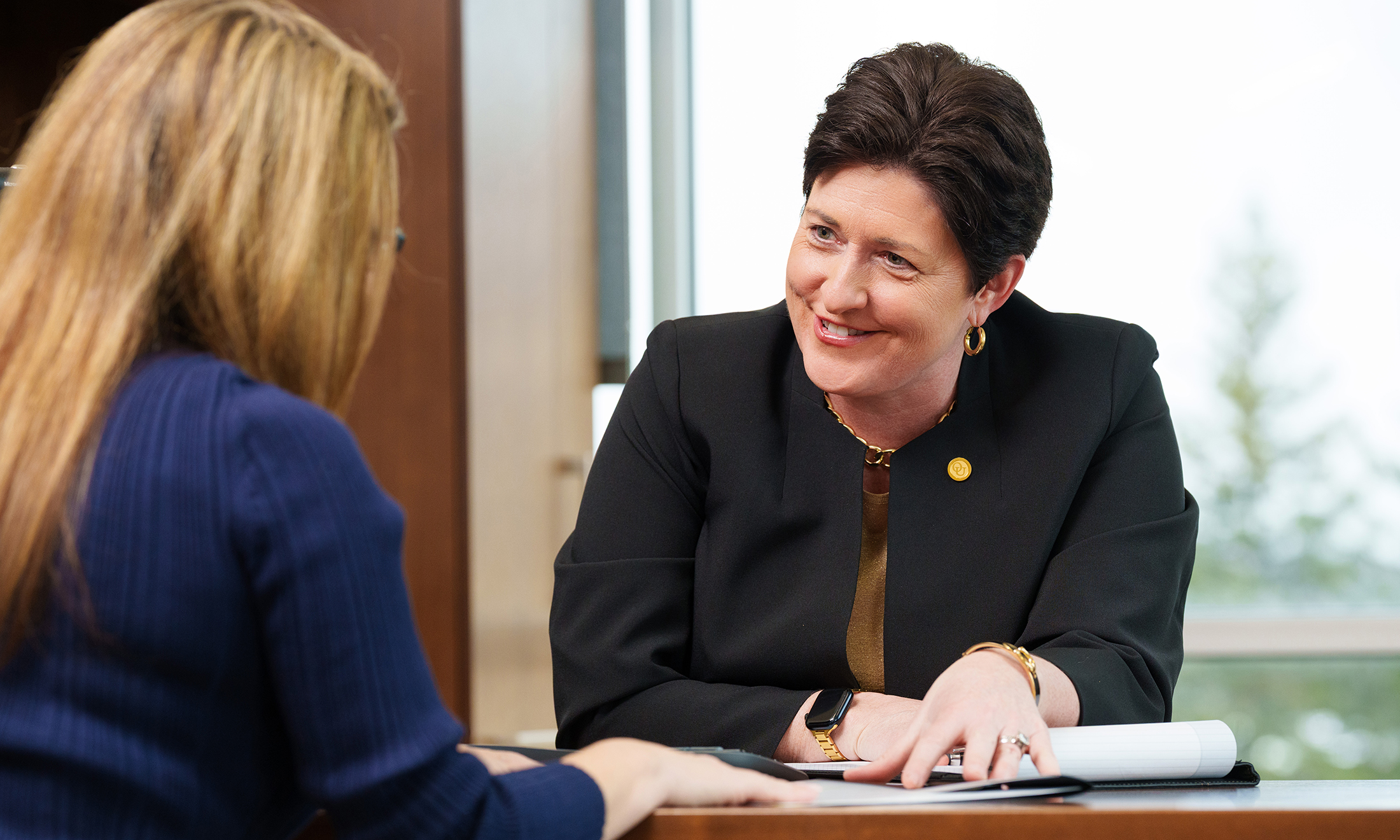 A person at a table talking