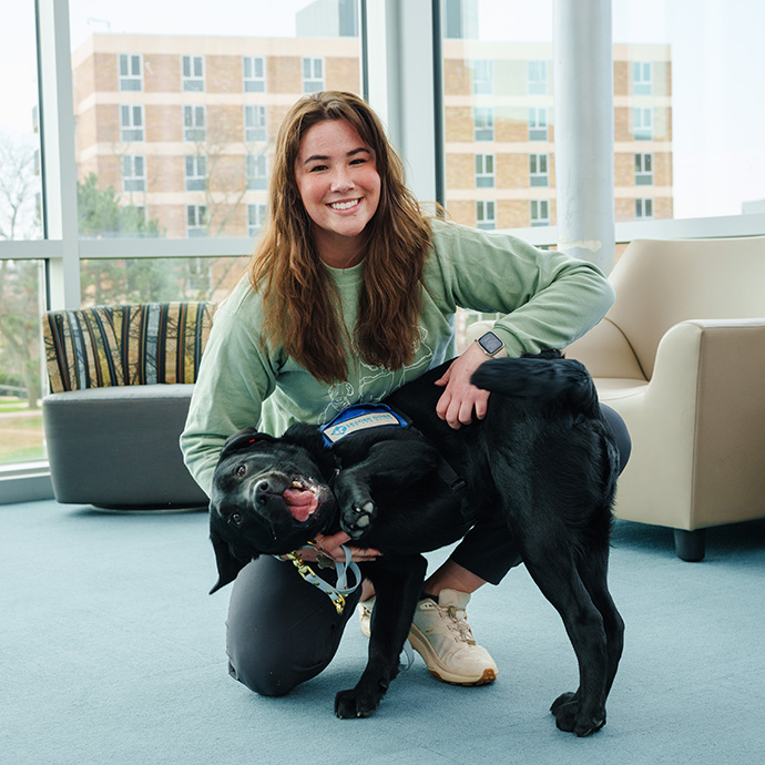 Mackenzie Nichols with dog