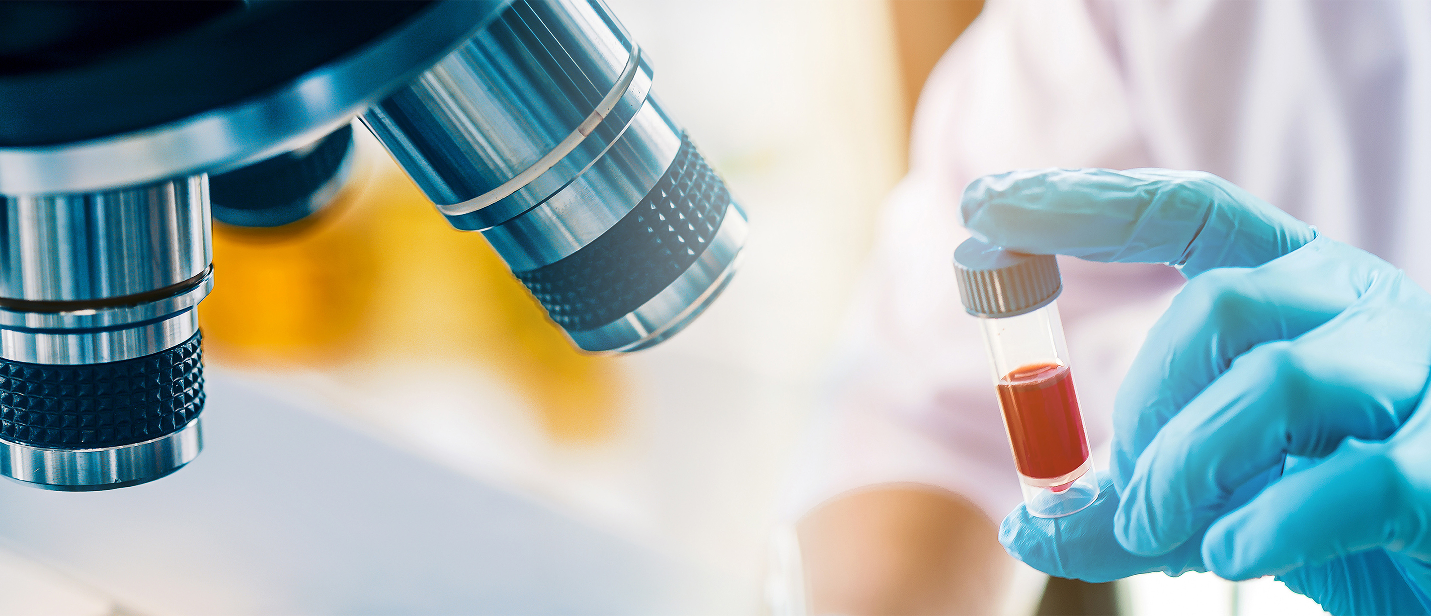 Embark - Clinical Research Banner An image of a microscope