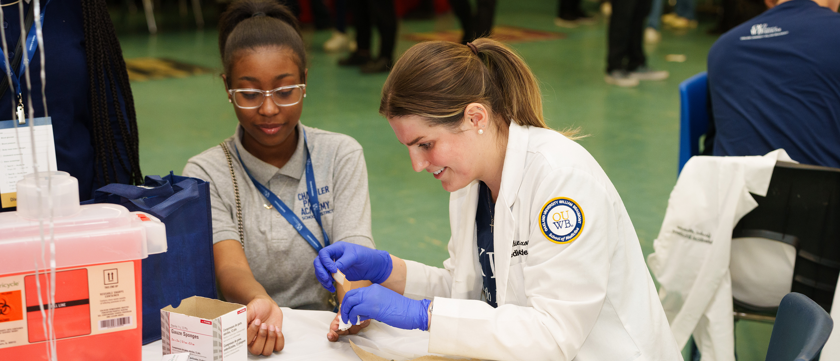 OUWB Career Development Banner An image of a medical student with a patient
