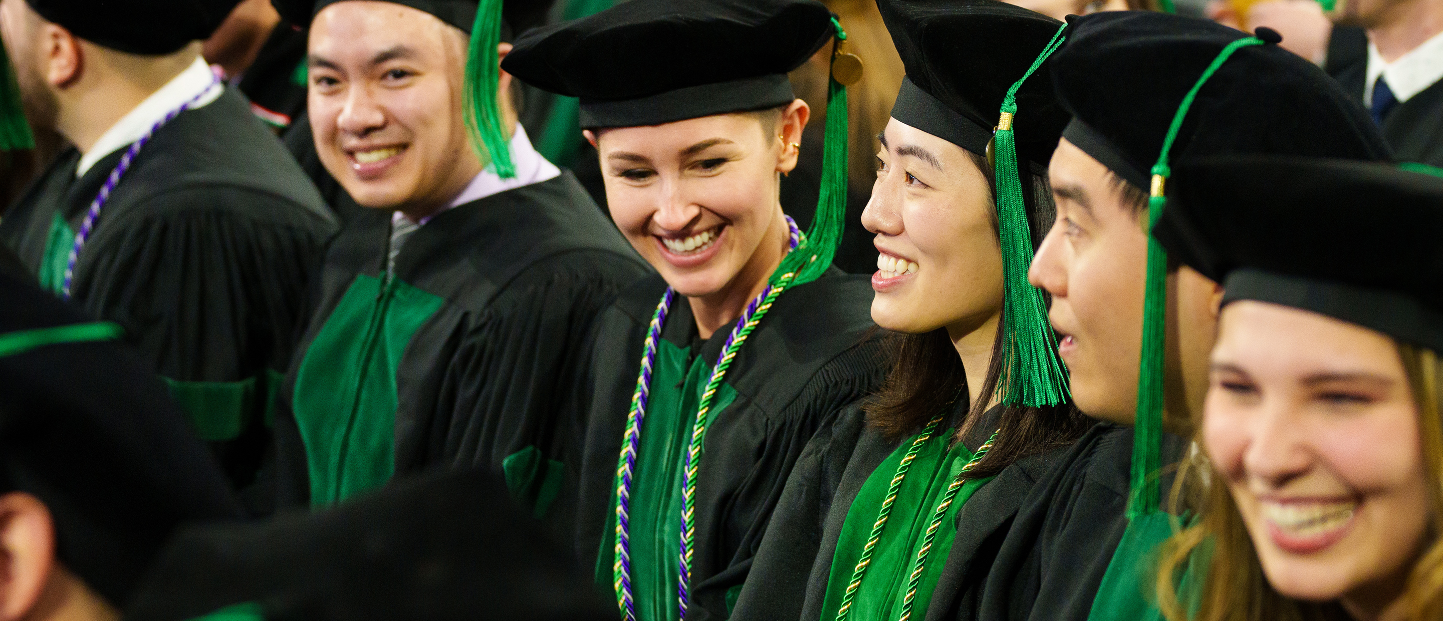 OUWB Giving Banner An image of OUWB students smiling at commencement