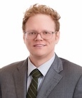 Michael Risner smiling at the camera