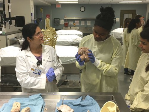 An image of two people at OUWB's anatomy lab