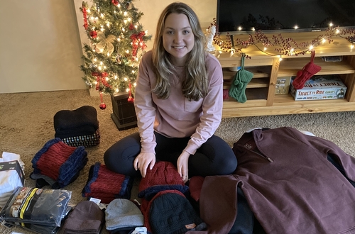 An image of a student with donated clothes