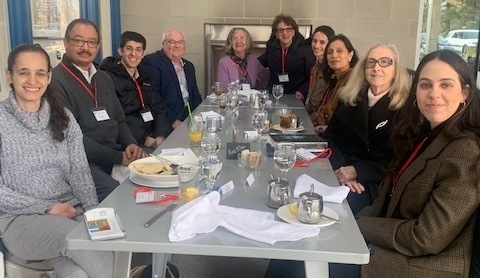 An image of people sitting at a table