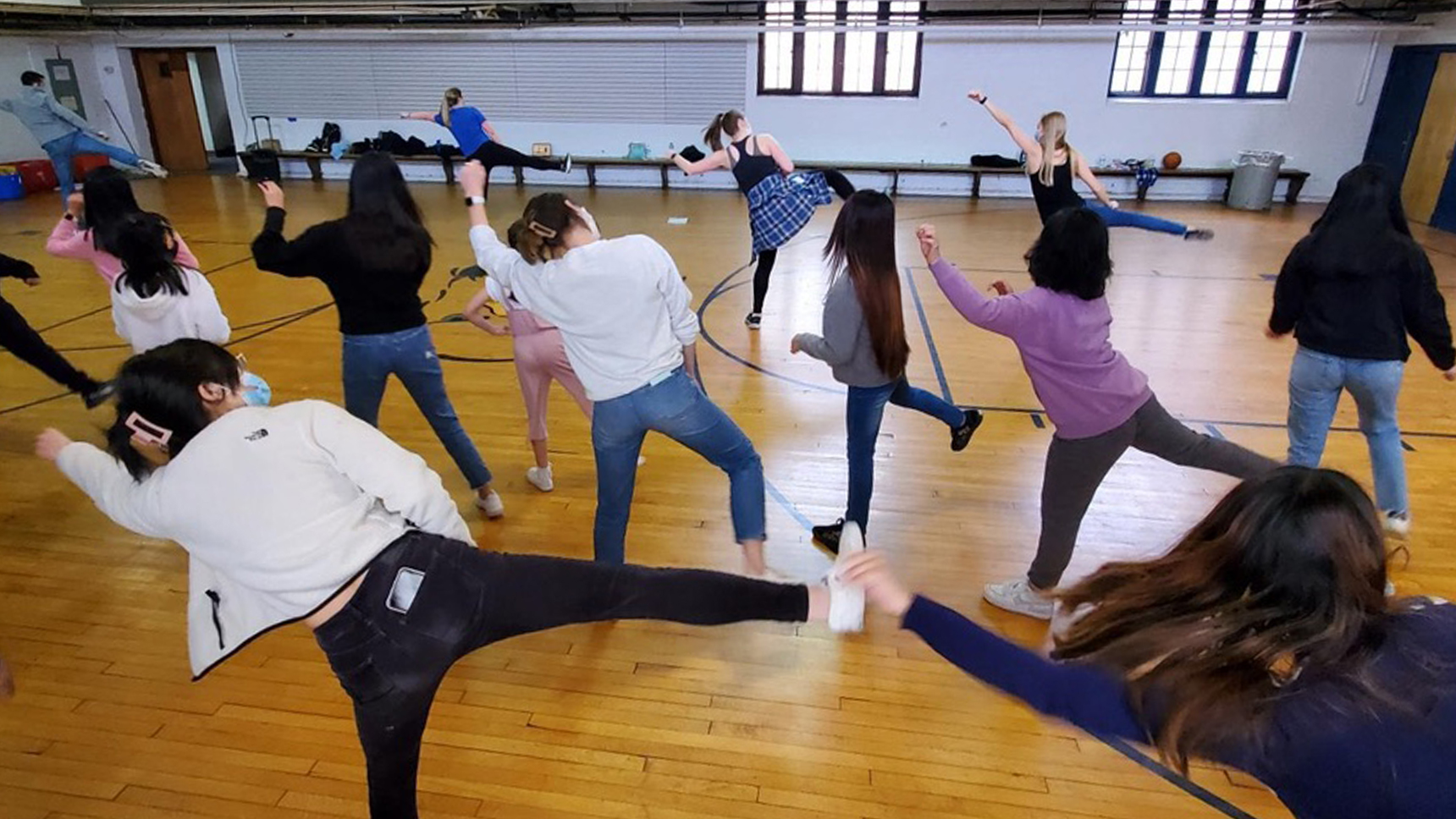 An image of a group of people dancing