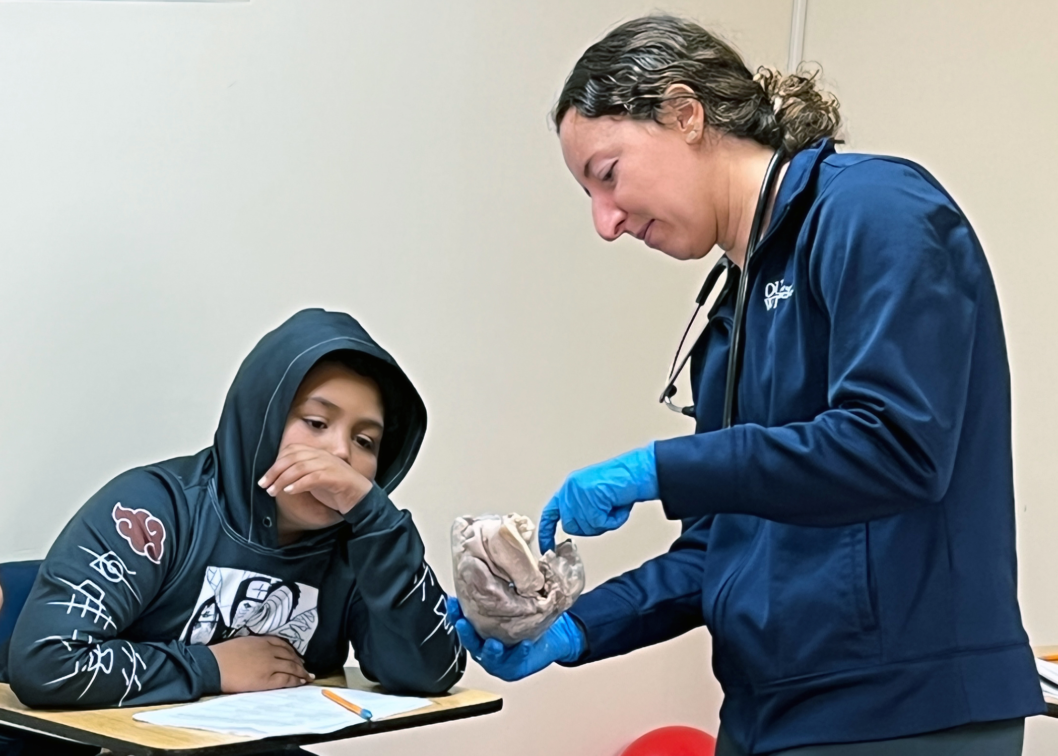 An image of an OUWB student teaching at the camp