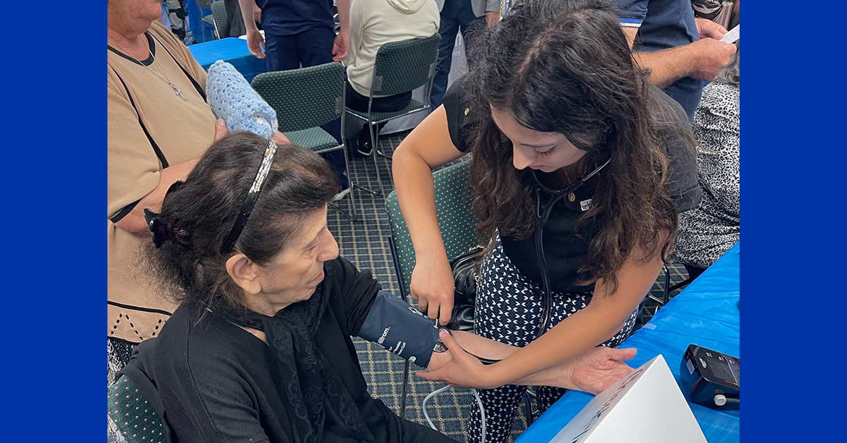 An image of a medical student with a patient