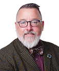 Headshot photo of Peter Trumbore