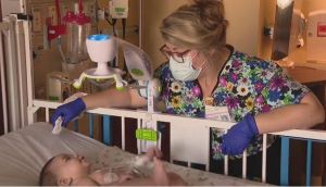 Nurse Caring For Baby