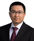 A headshot of Jun Chen