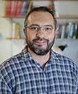 Esat Şanlı looking at the camera