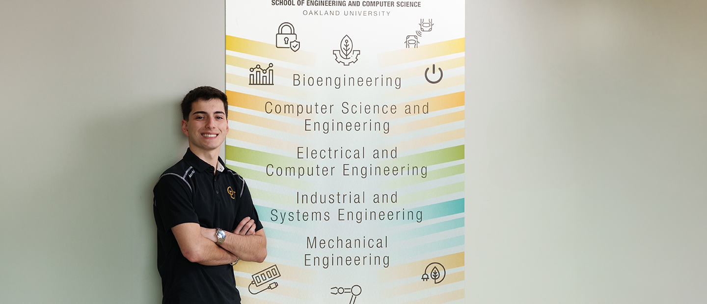 Career and Life Design for Students A student standing by a sign that says