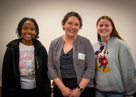 Professor Danielle Ligocki posing with a group of students