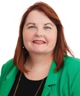 A headshot of Carol Piesik