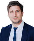 A headshot of Paul Andrews