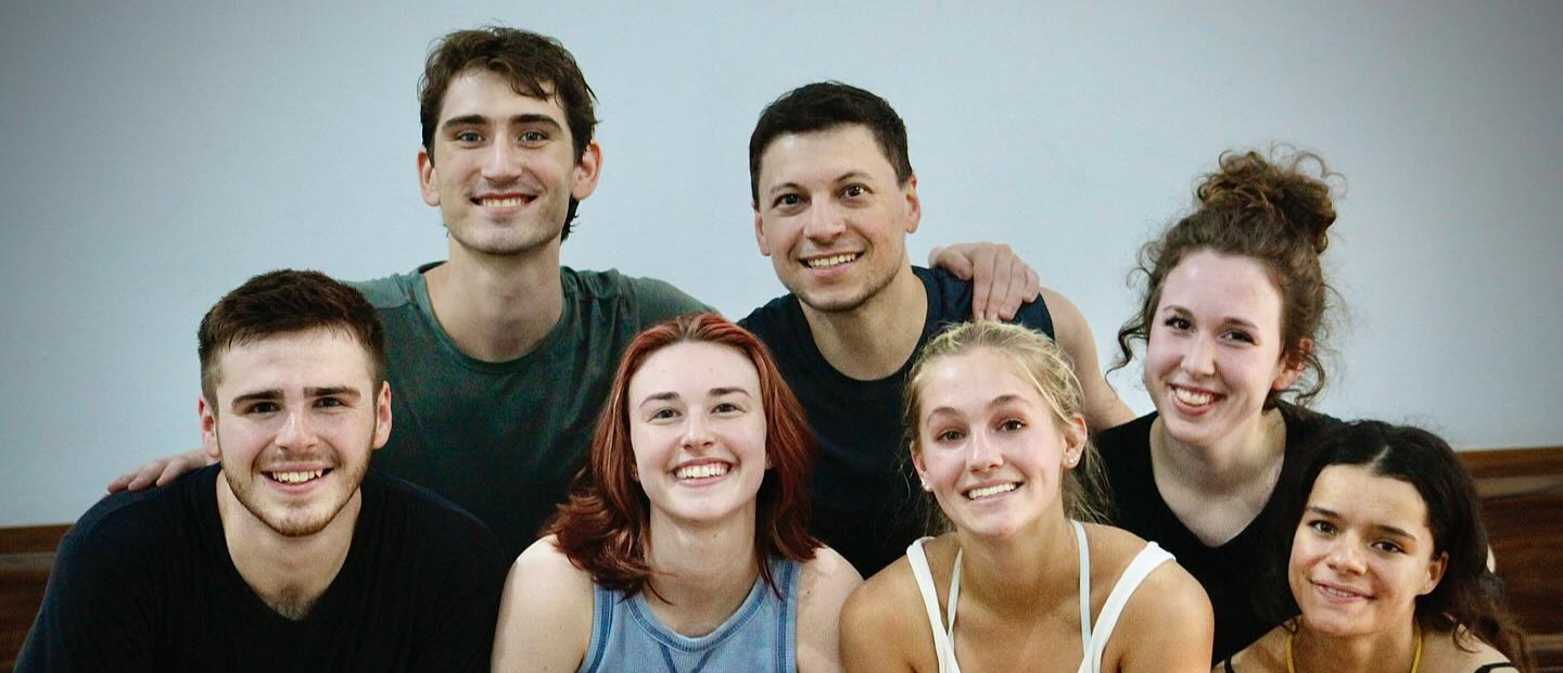 A group of students smiling at the camera