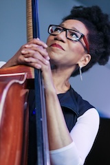 Marion Hayden holding a string instrument