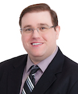 A headshot of Mike Anderson