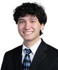Nicholas Hanna smiling at the camera