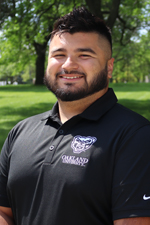 A headshot of Ernesto Duran outdoors.