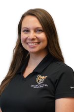 A professional headshot of Kelly Flemming in a black Oakland University shirt.