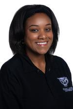 A professional headshot of Kourtney Howard.