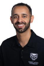 Mustafa Alsaegh smiling at the camera